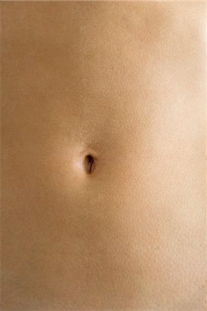 stomach (upper abdomen) - Woman's navel, close-up Stock Photo - Premium Royalty-Free, Code: 632-05760011