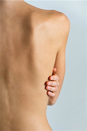 Woman's naked back, mid section Foto de stock - Sin royalties Premium, Código: 632-05760064