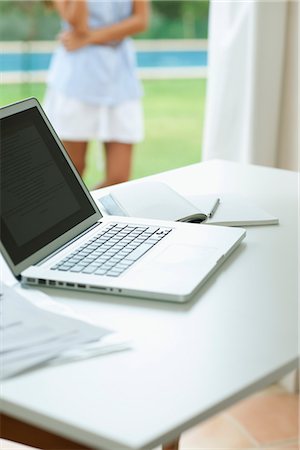 desk not studio not people - Laptop computer and notebook on desk Stock Photo - Premium Royalty-Free, Code: 632-05760172