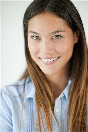 portrait of a beautiful young woman smile - Young woman, portrait Stock Photo - Premium Royalty-Free, Code: 632-05760483