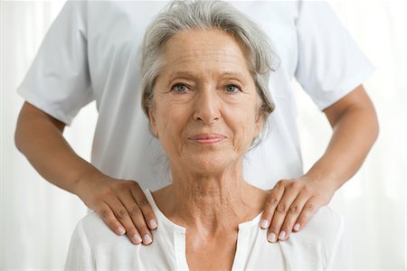 service - Senior woman getting a shoulder massage Stock Photo - Premium Royalty-Free, Code: 632-05760498