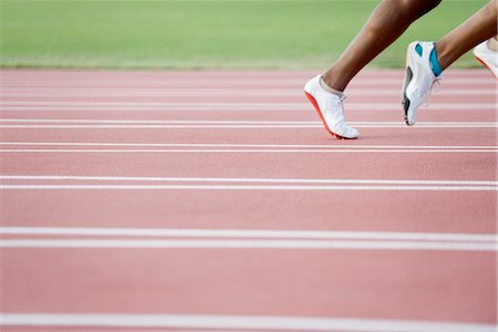 runner legs - Runners on track, cropped Stock Photo - Premium Royalty-Free, Code: 632-05760653