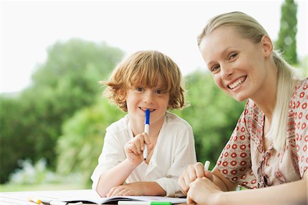 family child drawing - Mother and son coloring together, portrait Stock Photo - Premium Royalty-Free, Code: 632-05760695