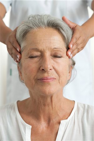 relaxation massage - Senior woman having her temples massaged, cropped Stock Photo - Premium Royalty-Free, Code: 632-05760804