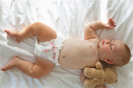 stuffed animal (toy) - Baby sleeping with teddy bear Stock Photo - Premium Royalty-Free, Code: 632-05816113