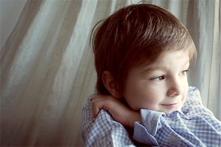 portrait looking away not happy - Boy daydreaming, portrait Stock Photo - Premium Royalty-Free, Code: 632-05816147