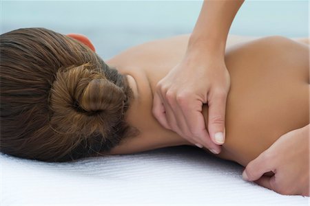 simsearch:614-03649034,k - Massage therapist giving woman massage, close-up Stock Photo - Premium Royalty-Free, Code: 632-05816273