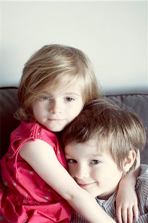 sister hugs - Young brother and sister embracing, portrait Stock Photo - Premium Royalty-Free, Code: 632-05816367