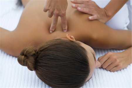 spa young woman massage - Woman receiving back massage, cropped Stock Photo - Premium Royalty-Free, Code: 632-05816395