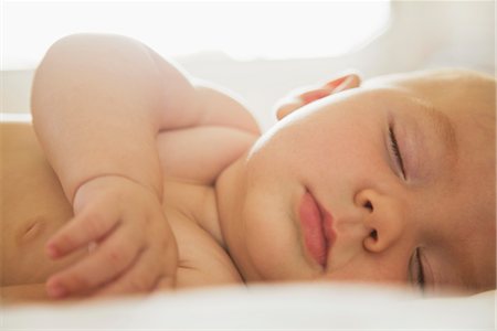 sleeping baby lying - Baby sleeping Stock Photo - Premium Royalty-Free, Code: 632-05816543