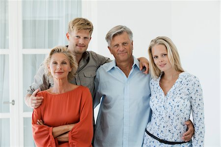 senior citizen with adult child - Mature parents with their adult son and daughter, portrait Stock Photo - Premium Royalty-Free, Code: 632-05816623