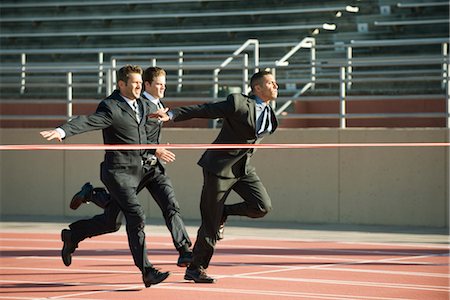 simsearch:857-03553946,k - Businessmen approaching finish line in race Stock Photo - Premium Royalty-Free, Code: 632-05816782