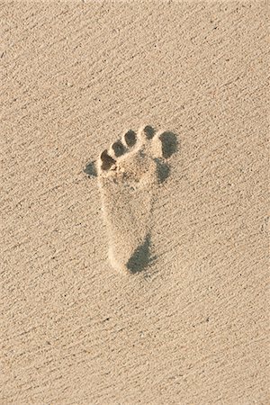 footprints sandy beach - Footprint in sand Stock Photo - Premium Royalty-Free, Code: 632-05816845