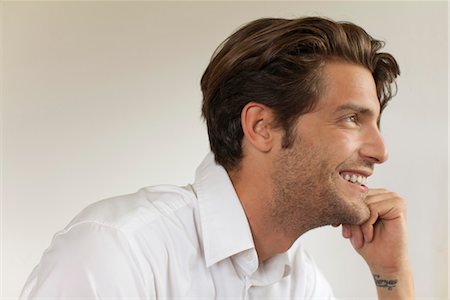 smiling profile - Man looking away, smiling Stock Photo - Premium Royalty-Free, Code: 632-05816842