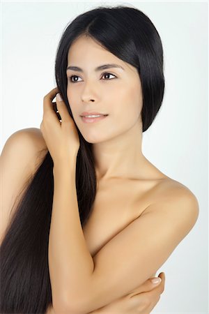 dark hair - Nude woman with arms folded across chest, portrait Stock Photo - Premium Royalty-Free, Code: 632-05816858
