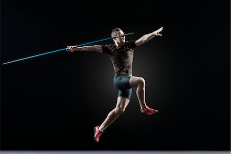 endurance - Male athlete leaping with javelin Stock Photo - Premium Royalty-Free, Code: 632-05817029