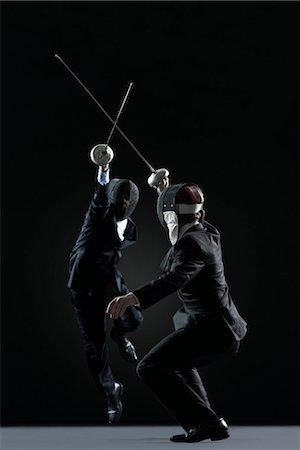 Businessmen fencing Foto de stock - Sin royalties Premium, Código: 632-05845000