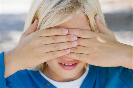 simsearch:632-03754475,k - Boy covering eyes with hands Stock Photo - Premium Royalty-Free, Code: 632-05845048