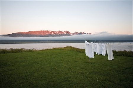 Laundry drying on clothes-line in remote landscape, Vopnafjordur, Iceland Stock Photo - Premium Royalty-Free, Code: 632-05845074