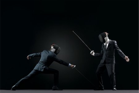 Les hommes d'affaires d'escrime Photographie de stock - Premium Libres de Droits, Code: 632-05845116