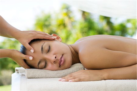 Woman having her head massaged Stock Photo - Premium Royalty-Free, Code: 632-05845172