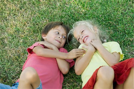Young friends lying together on grass Stock Photo - Premium Royalty-Free, Code: 632-05845210