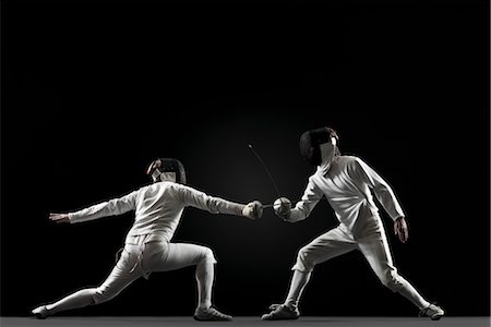 Fencers fencing Foto de stock - Sin royalties Premium, Código: 632-05845357