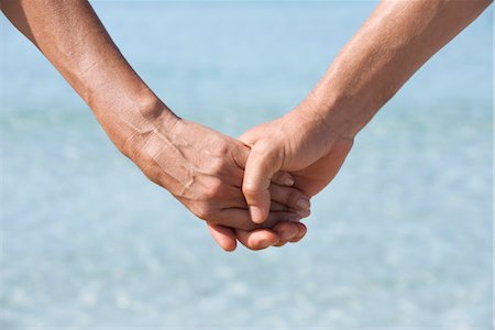 Couple holding hands, cropped Stock Photo - Premium Royalty-Free, Code: 632-05845681
