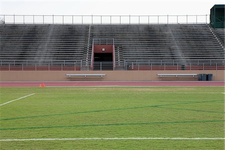 stadium bleachers - Empty stadium and track Stock Photo - Premium Royalty-Free, Code: 632-05991127