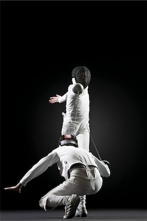 Fencers fencing Fotografie stock - Premium Royalty-Free, Codice: 632-05991248