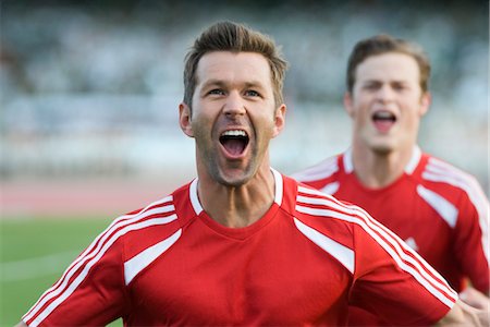 people running yelling - Soccer players cheering Stock Photo - Premium Royalty-Free, Code: 632-05991326