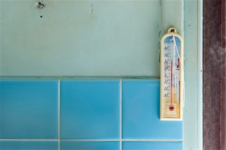 simsearch:632-06118390,k - Thermometer hanging on wall Stock Photo - Premium Royalty-Free, Code: 632-05991426