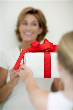 simsearch:632-06029820,k - Girl giving mother gift Stock Photo - Premium Royalty-Free, Code: 632-05991515
