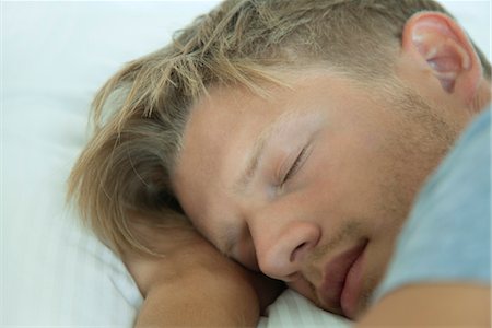 Young man sleeping, cropped Stock Photo - Premium Royalty-Free, Code: 632-05991560