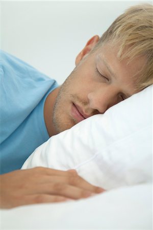 Young man sleeping, cropped Stock Photo - Premium Royalty-Free, Code: 632-05991642