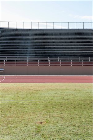 stadium bleachers - Empty stadium and running track Stock Photo - Premium Royalty-Free, Code: 632-05991852