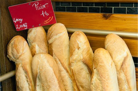 freshly baked bread - Fresh baguettes for sale Stock Photo - Premium Royalty-Free, Code: 632-05992122