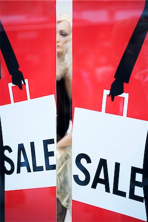 Sale signs in shop window Stock Photo - Premium Royalty-Free, Code: 632-06029354