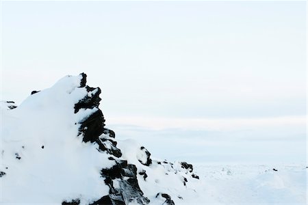 reykjanes - Volcanic rock covered in snow, Reykjanes Peninsula, Iceland Foto de stock - Sin royalties Premium, Código: 632-06029517