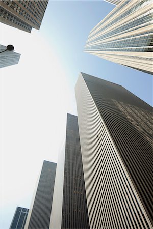 simsearch:632-02885217,k - Low angle view of skyscrapers, New York City, New York, USA Foto de stock - Royalty Free Premium, Número: 632-06029949