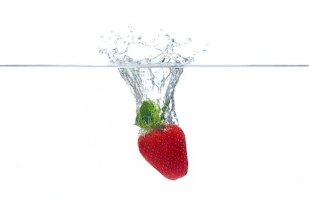 strawberries white background nobody - Strawberry splashing into water Stock Photo - Premium Royalty-Free, Code: 632-06030139