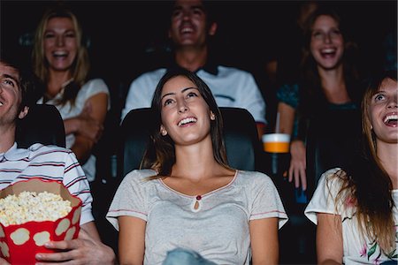 Audience laughing in movie theater Foto de stock - Sin royalties Premium, Código: 632-06118193