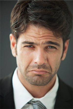 Man with sad expression, portrait Stock Photo - Premium Royalty-Free, Code: 632-06118257