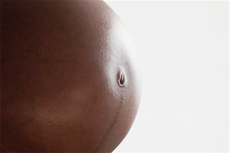 simsearch:632-06318000,k - Pregnant woman's belly Fotografie stock - Premium Royalty-Free, Codice: 632-06118561