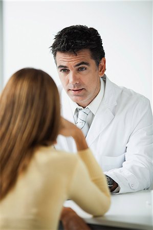 Doctor meeting with patient for consultation Stock Photo - Premium Royalty-Free, Code: 632-06118852