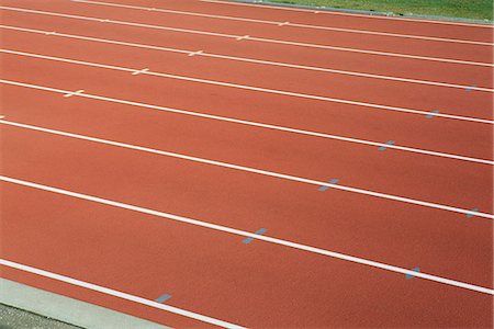 simsearch:632-05991758,k - Running track lanes Fotografie stock - Premium Royalty-Free, Codice: 632-06118911