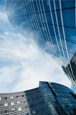 Facade of modern buildings against sky, low angle view Stock Photo - Premium Royalty-Free, Code: 632-06317211