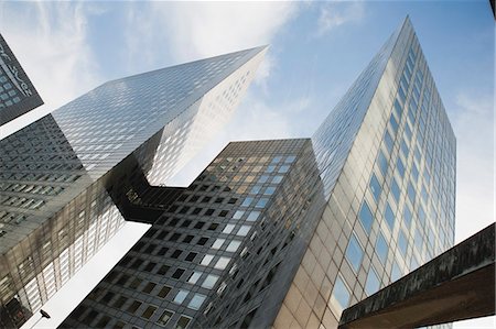 Facade of skyscrapers, low angle view Stock Photo - Premium Royalty-Free, Code: 632-06317354