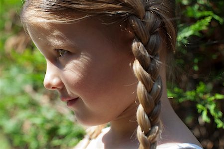 Little girl with braids, profile Stock Photo - Premium Royalty-Free, Code: 632-06317775