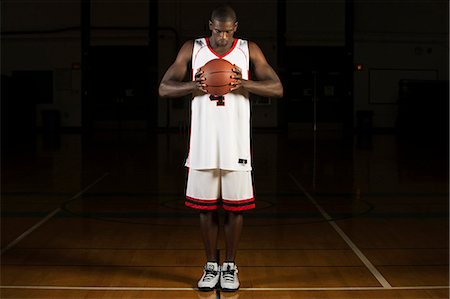 sports basketball male - Basketball player holding basketball, portrait Stock Photo - Premium Royalty-Free, Code: 632-06317788